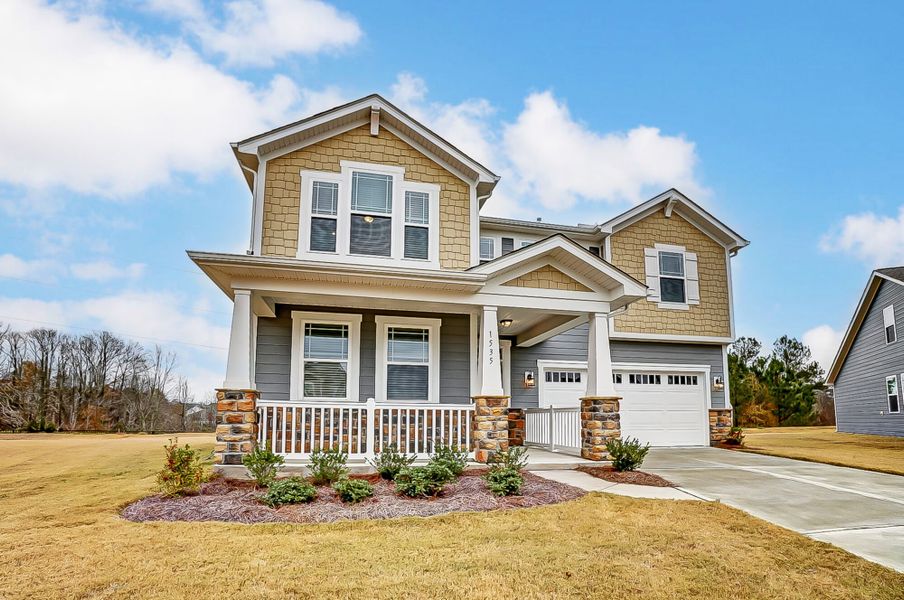 Exterior front with 2-car garage