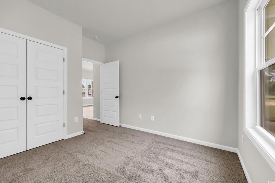 Spacious, unfurnished interior of a new home in Briarfield, Conway (Image 25).