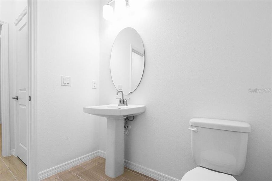 Furnished interior view inside a new home in Ardisia Park, New Smyrna Beach (Image 7).