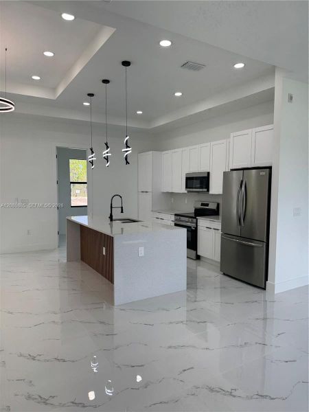 Furnished interior view inside a new home in , Lehigh Acres (Image 3).