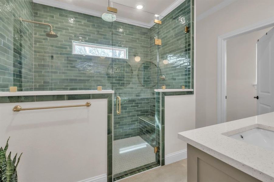 Bathroom featuring vanity, a shower stall, crown molding, and recessed lighting Bathroom featuring vanity, a shower stall, crown molding, and recessed lighting