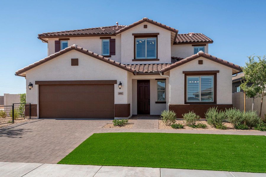 Representative exterior photo of a completed home built from the Monument by Risewell Homes in Wildera, San Tan Valley, AZ (Image 1). Representative exterior photo of a completed home built from the Monument by Risewell Homes in Wildera, San Tan Valley, AZ (Image 1).