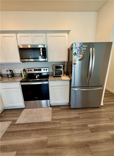 Furnished interior view inside a new home in , Palmetto (Image 10).