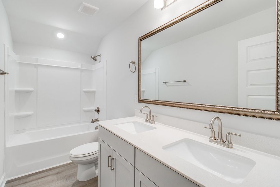 Furnished interior view inside a new home in Pebble Branch, Chapin (Image 13). Furnished interior view inside a new home in Pebble Branch, Chapin (Image 13).
