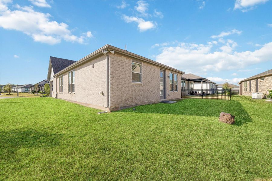 Exterior details and patio area of a home in , Willis (Image 23). Exterior details and patio area of a home in , Willis (Image 23).