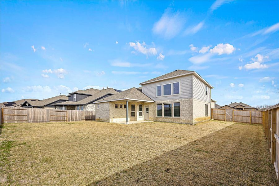 Exterior details and patio area of a home in River Ranch Meadows, Dayton (Image 3). Exterior details and patio area of a home in River Ranch Meadows, Dayton (Image 3).