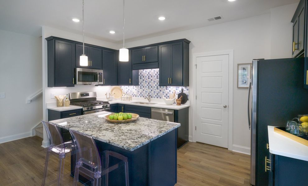 Representative furnished interior of a home built from the The Kensington A by Cothran Homes in Reidville Town Center, Reidville (Image 19).