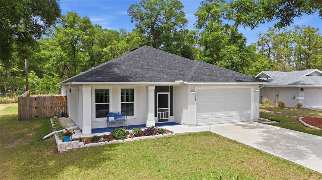 Front exterior of a new home in , Silver Springs, FL, highlighting curb appeal (Image 23).