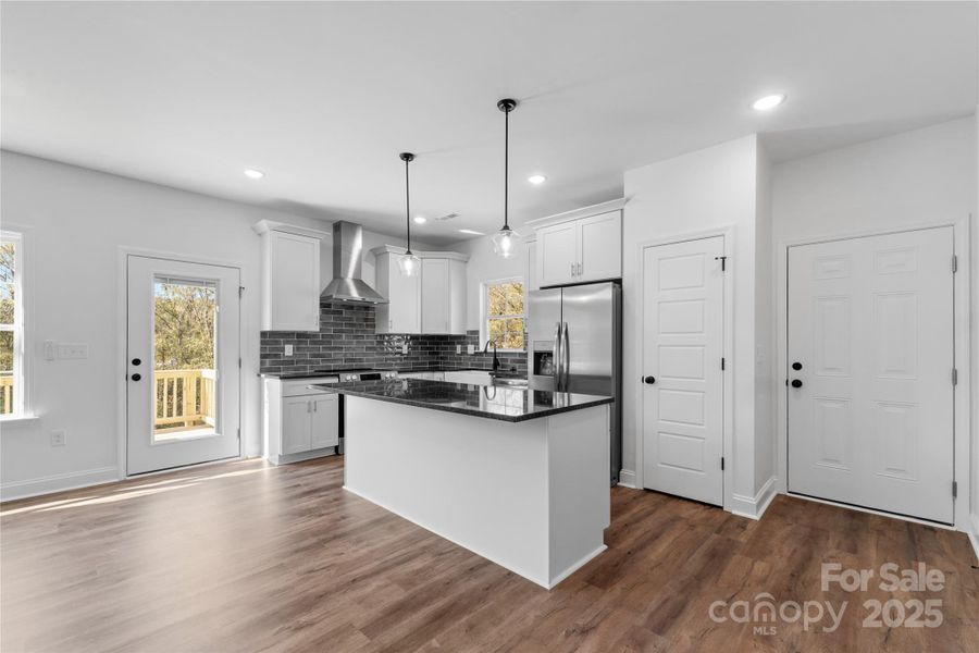 kitchen complete w/ a pantry, porcelain white farmhouse sink & a hood vent! *dishwasher & fridge included kitchen complete w/ a pantry, porcelain white farmhouse sink & a hood vent! *dishwasher & fridge included