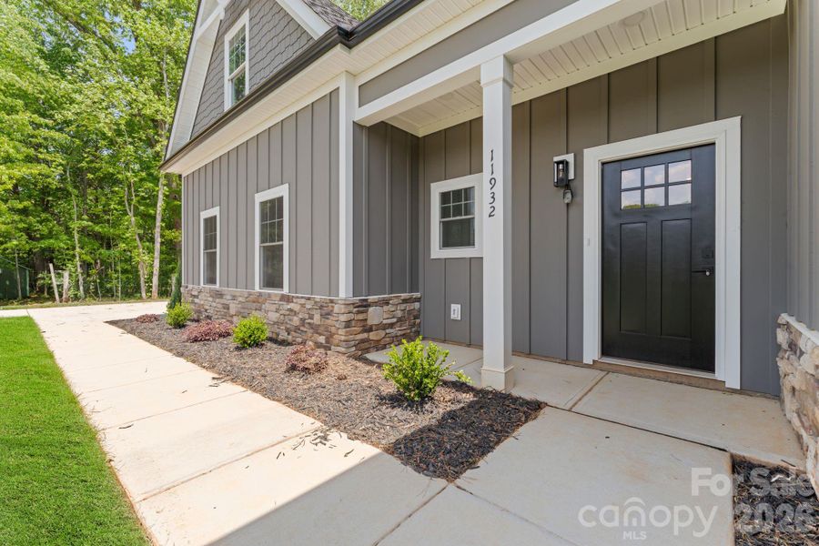 Exterior details and patio area of a home in , Huntersville (Image 25).