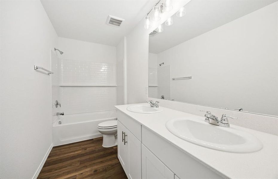 Spacious secondary bathroom with double vanity