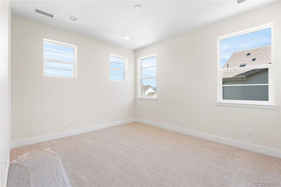 Spacious, unfurnished interior of a new home in Luxe at The Canyons, Castle Pines (Image 36).