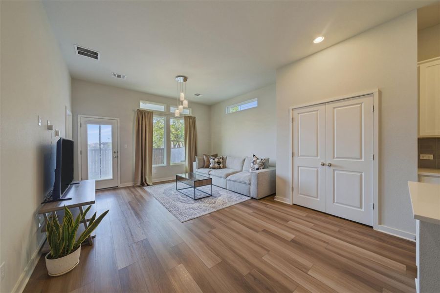 Spacious living room and open dining room space