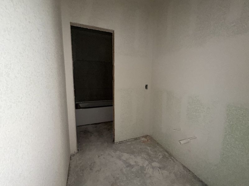 In-progress construction of a new home in Saddle Crest Estates, Weatherford, TX (Image 29).