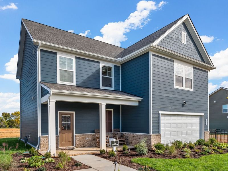 Front exterior of a new home in Sage Farms, White House, TN, highlighting curb appeal (Image 2). Front exterior of a new home in Sage Farms, White House, TN, highlighting curb appeal (Image 2).