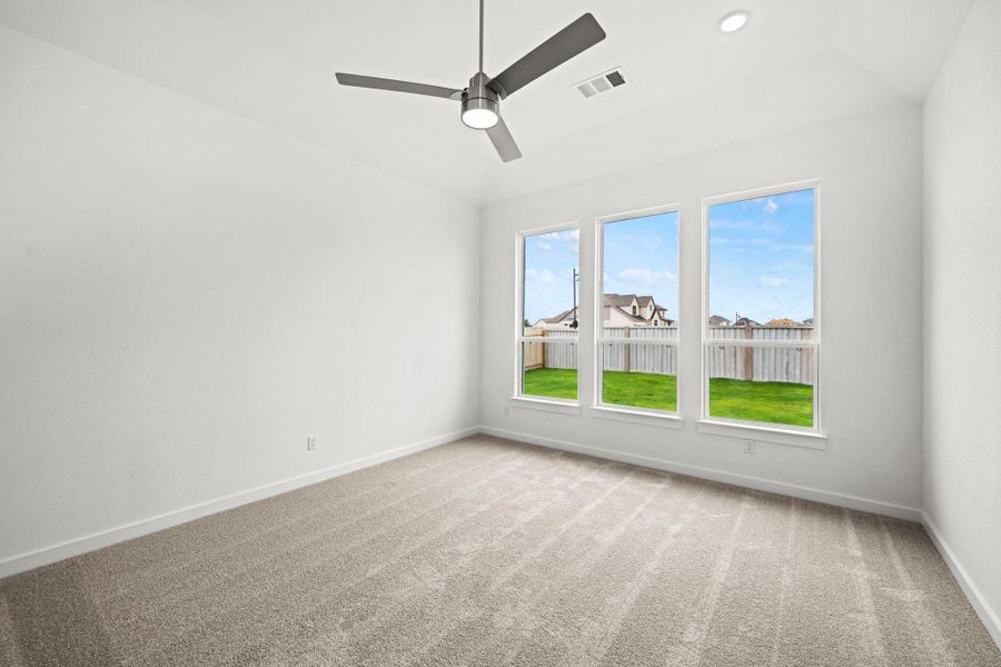 Primary Bedroom with elevated ceiling