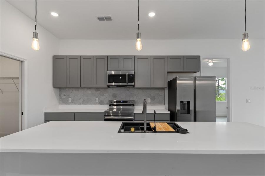 Furnished interior view inside a new home in , Port Charlotte (Image 11).