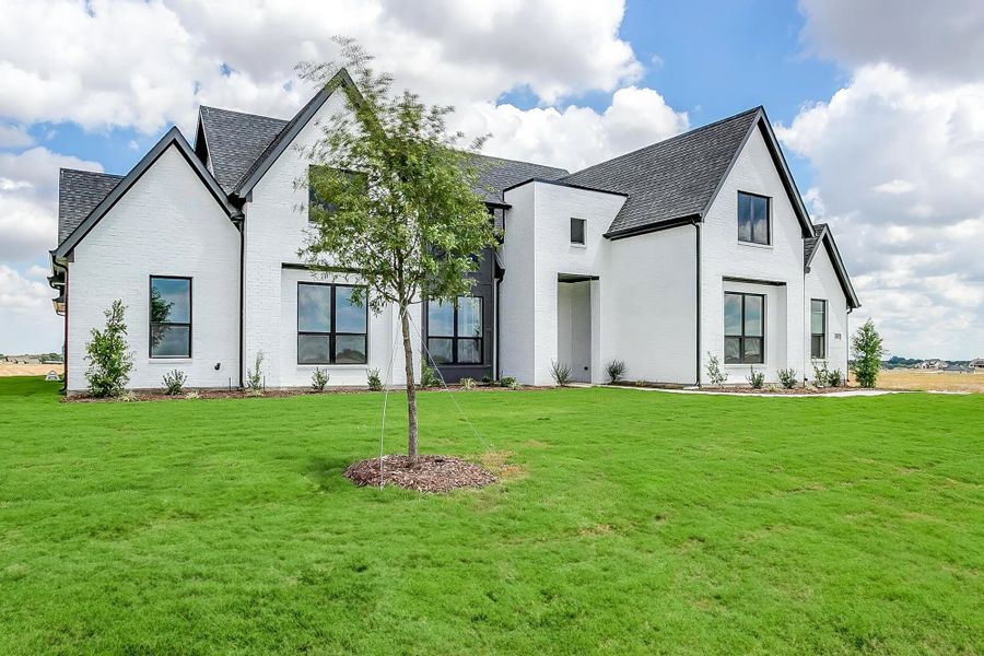 Representative exterior photo of a completed home built from the The Blaire by Elmwood Custom Homes in Matthews Farm, Venus, TX (Image 3).