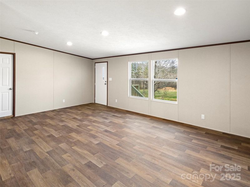 Spacious, unfurnished interior of a new home in , Old Fort (Image 9).