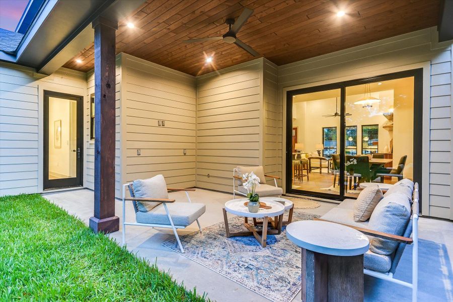 Cozy covered patio w/wooden ceiling, recessed lighting, ceiling fan, and direct access to gorgeous backyard. Cozy covered patio w/wooden ceiling, recessed lighting, ceiling fan, and direct access to gorgeous backyard.