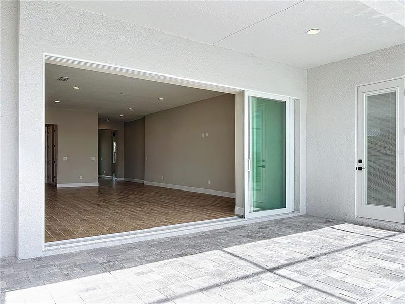 Front exterior of a new home in Watercolor Place Single Family Homes, Bradenton, FL, highlighting curb appeal (Image 25).