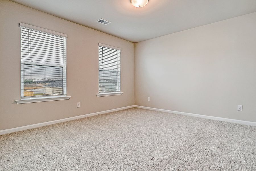 Representative unfurnished interior of a home built from the Washington by Ashton Woods in Watson Hill, Summerville (Image 9).
