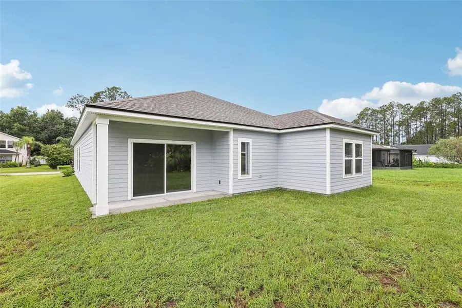 Exterior details and patio area of a home in , Palm Coast (Image 27).