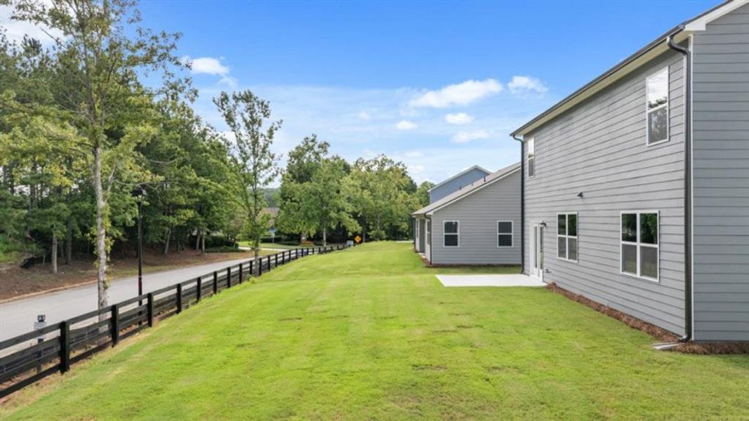 Exterior details and patio area of a home in Fairway 17 at Mirror Lake, Villa Rica (Image 3). Exterior details and patio area of a home in Fairway 17 at Mirror Lake, Villa Rica (Image 3).