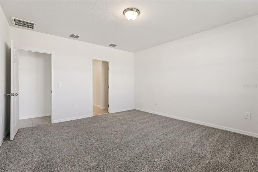 Spacious, unfurnished interior of a new home in Lawson Dunes - Signature Series, Haines City (Image 25). Spacious, unfurnished interior of a new home in Lawson Dunes - Signature Series, Haines City (Image 25).