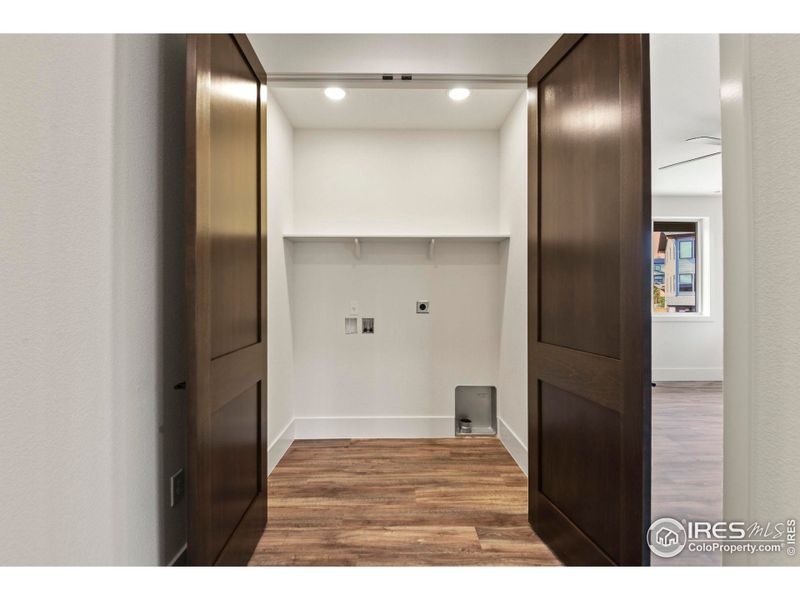 Convenient laundry room close to the bedrooms on upper floor.