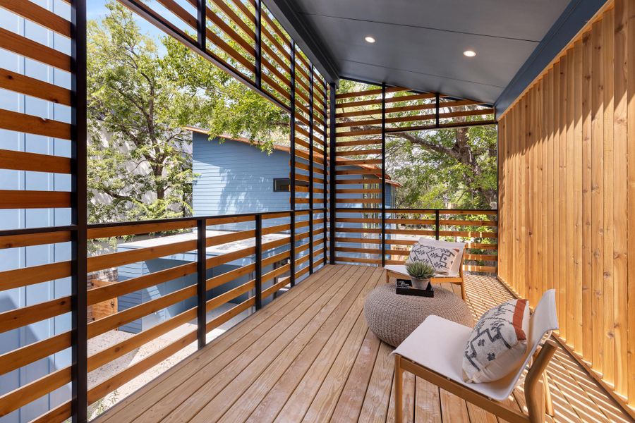 The protected outdoor deck extends the primary suite into a peaceful private setting. The protected outdoor deck extends the primary suite into a peaceful private setting.