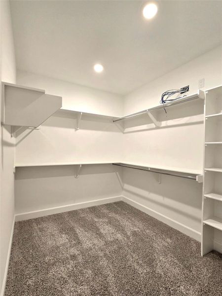 Walk-in Closet in the primary bedroom Walk-in Closet in the primary bedroom