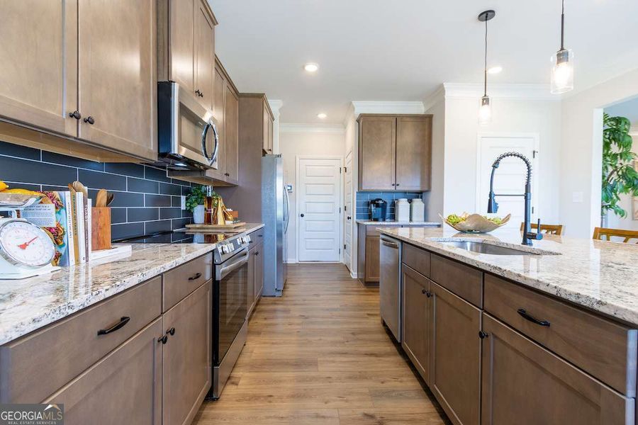 Furnished interior view inside a new home in Bryson Farms, Byron (Image 6).