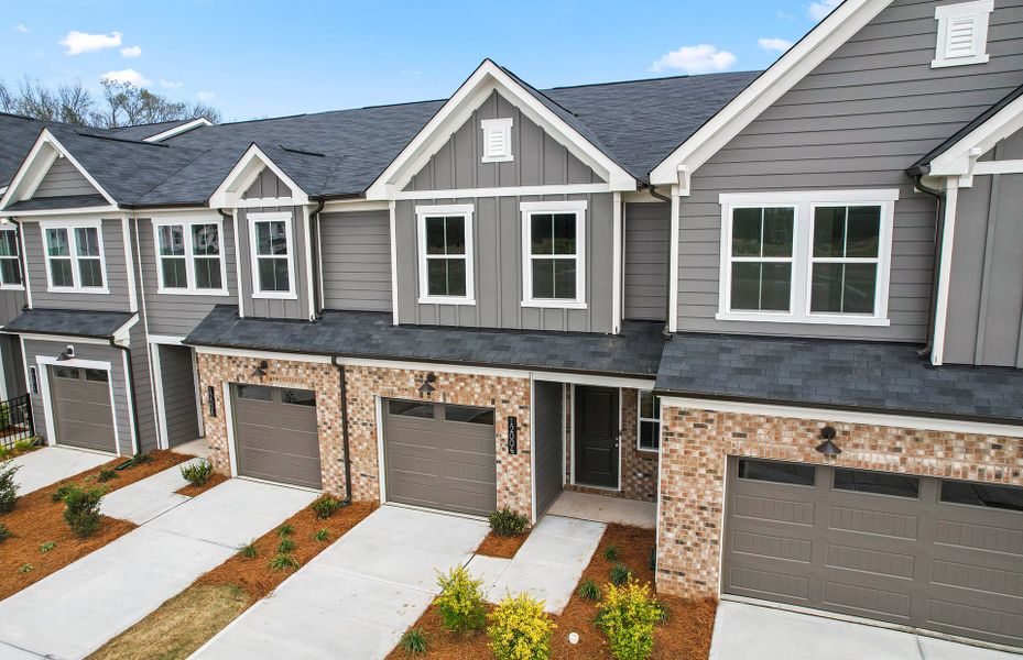 Front exterior of a new home in Mallard Park, Charlotte, NC, highlighting curb appeal (Image 24). Front exterior of a new home in Mallard Park, Charlotte, NC, highlighting curb appeal (Image 24).