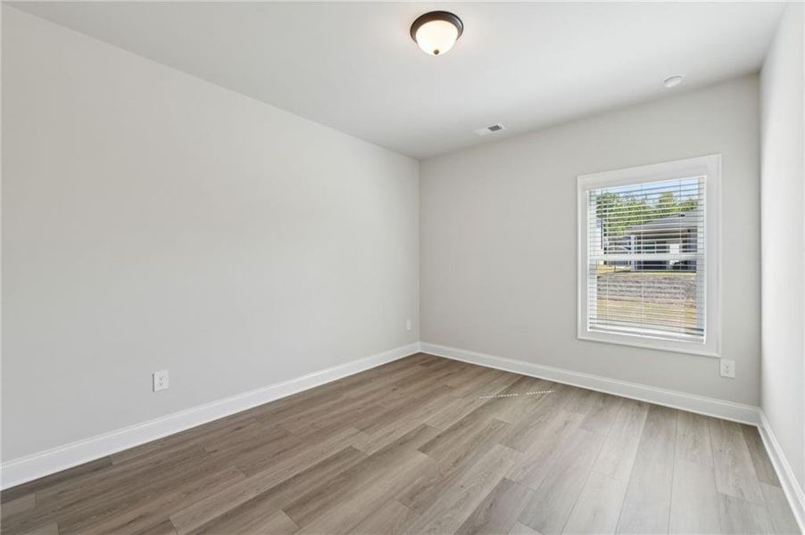 Spacious, unfurnished interior of a new home in Vines at Mill Creek - Estate Series, Braselton (Image 49).
