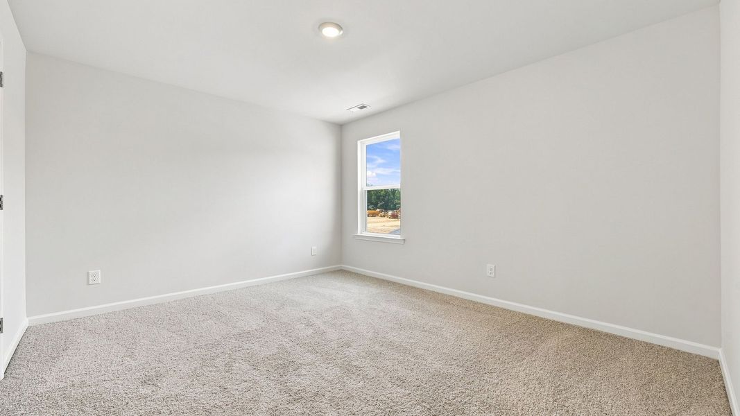 Spacious, unfurnished interior of a new home in Carter Ridge, Greenville (Image 32).