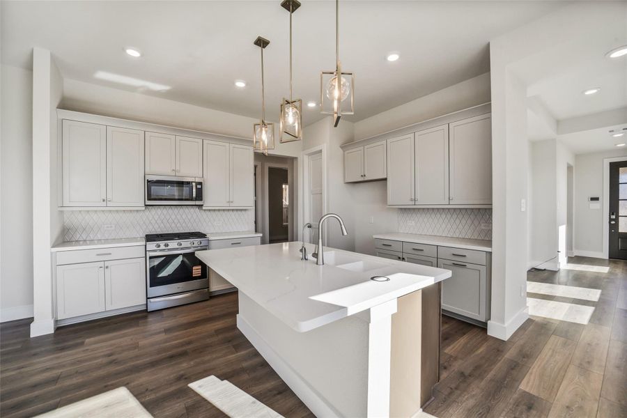 Furnished interior view inside a new home in Sunterra, Katy (Image 9).
