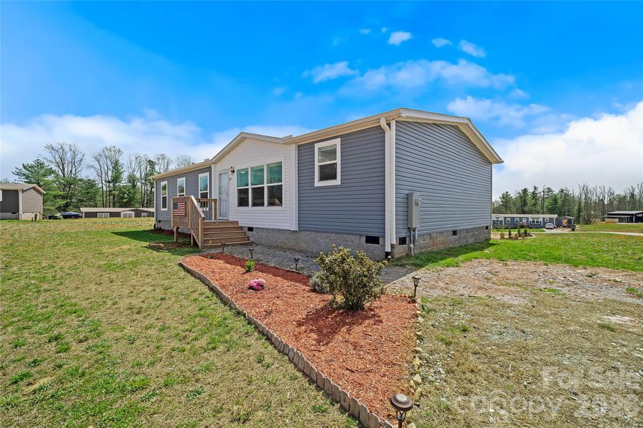 Exterior details and patio area of a home in , Hendersonville (Image 23).