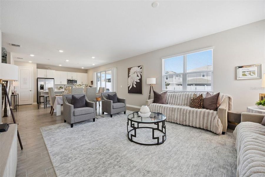 Furnished interior view inside a new home in Seasons at The Grove, Mascotte (Image 10).