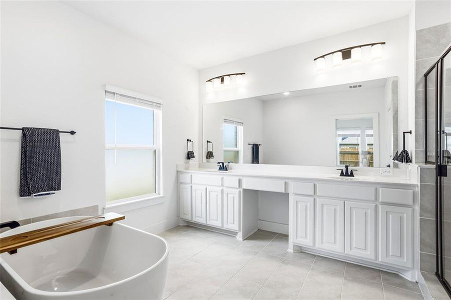 Furnished interior view inside a new home in The Villages of Hurricane Creek, Anna (Image 14).