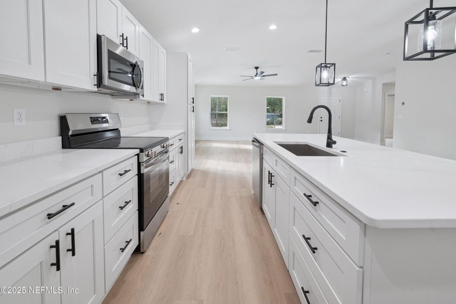 Furnished interior view inside a new home in , Florahome (Image 7).