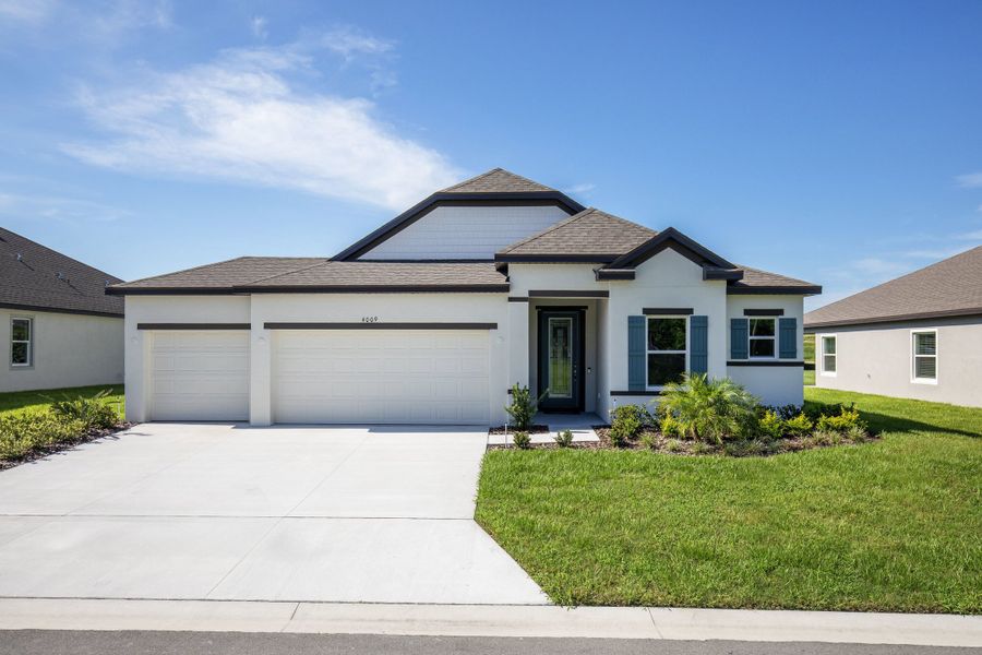 Front exterior of a new home in Silver Springs Shores, Ocala, FL, highlighting curb appeal (Image 22). Front exterior of a new home in Silver Springs Shores, Ocala, FL, highlighting curb appeal (Image 22).