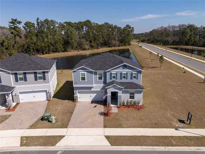 Front exterior of a new home in , Clermont, FL, highlighting curb appeal (Image 2). Front exterior of a new home in , Clermont, FL, highlighting curb appeal (Image 2).