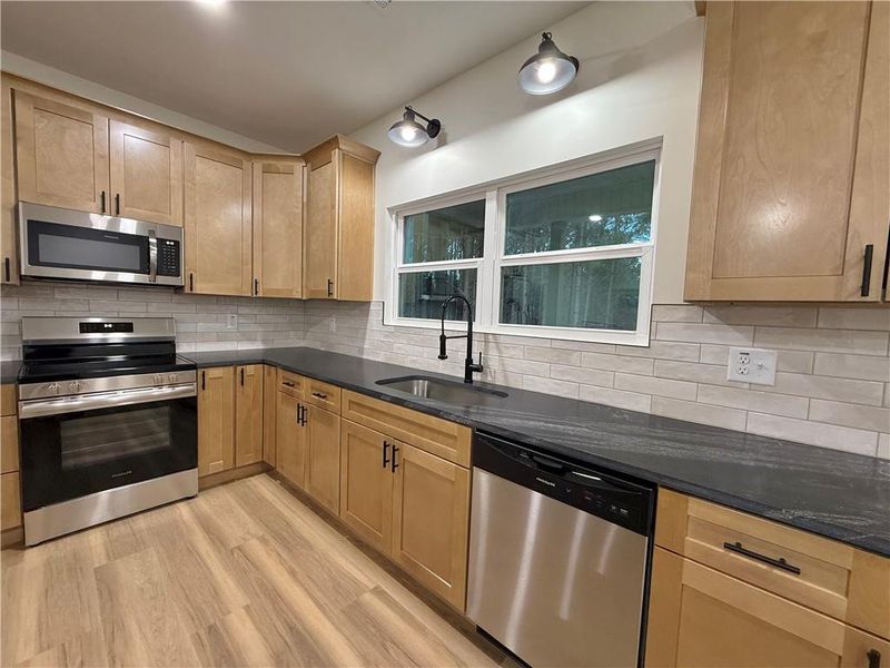 Furnished interior view inside a new home in , Calhoun (Image 6).
