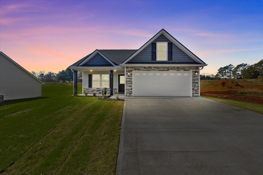Representative exterior photo of a completed home built from the Morgan by Enchanted Homes in Lonesome Dove, San Antonio, TX (Image 20).