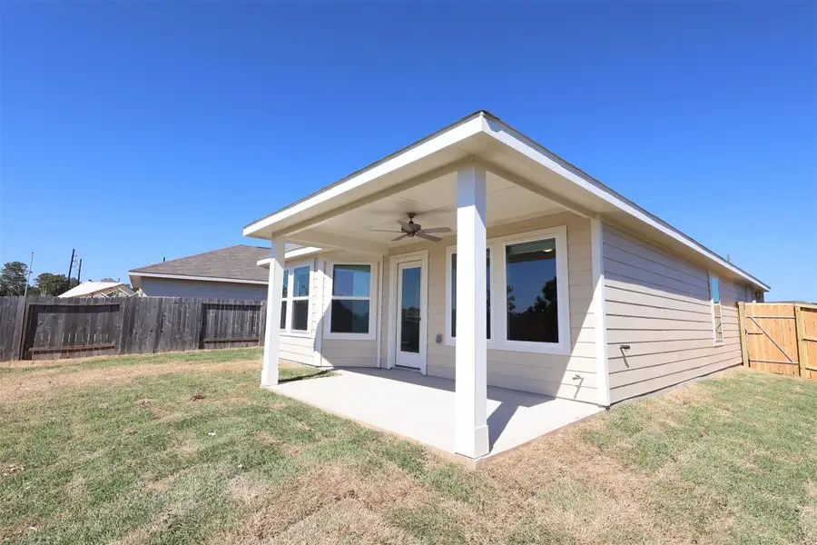 Exterior details and patio area of a home in Magnolia Ridge, Magnolia (Image 16). Exterior details and patio area of a home in Magnolia Ridge, Magnolia (Image 16).