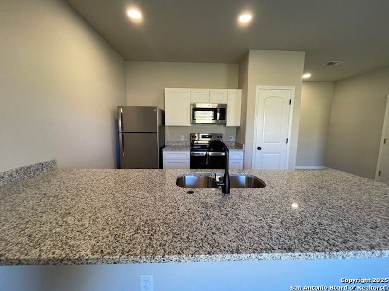 Furnished interior view inside a new home in , San Antonio (Image 5).