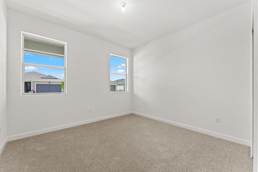 Spacious, unfurnished interior of a new home in Tradition - Cadence, Port St. Lucie (Image 12).