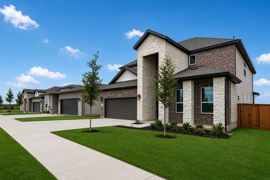 Representative exterior photo of a completed home built from the Piedmont by Taylor Morrison in Santa Rita Ranch, Liberty Hill, TX (Image 25). Representative exterior photo of a completed home built from the Piedmont by Taylor Morrison in Santa Rita Ranch, Liberty Hill, TX (Image 25).