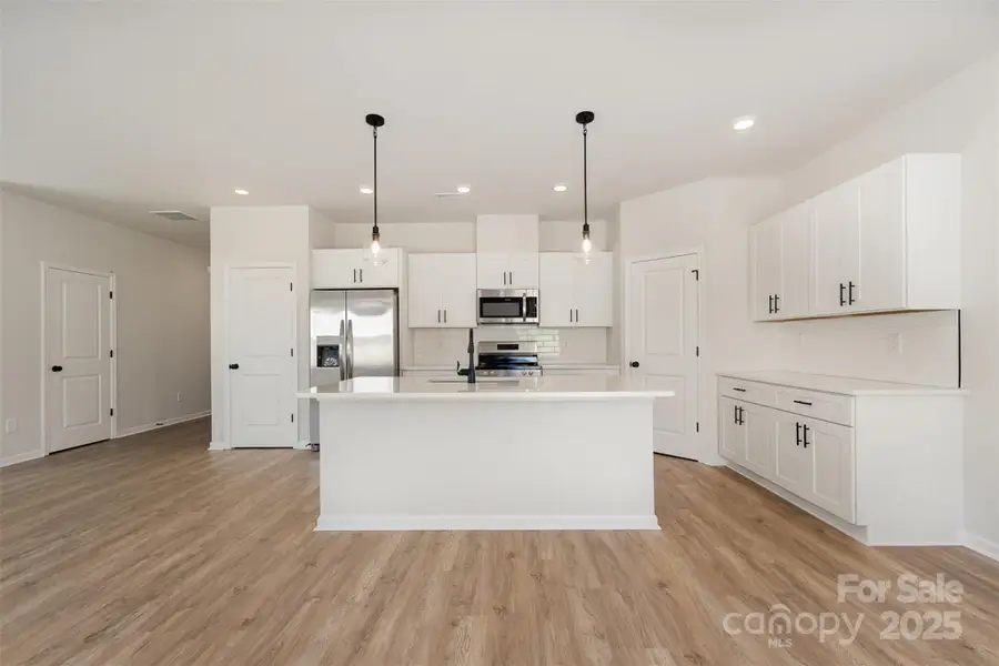 Spacious Kitchen w/ side serving area. Representational Photo.